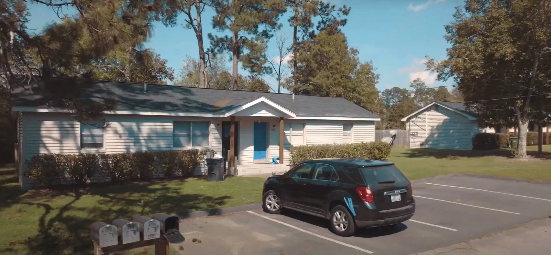 Street view of The Mill Gardens Apartments